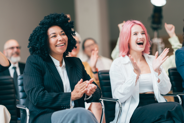 Marketing leaders engaging at a professional conference.