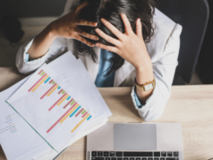 Caught in an Influencer Marketing Crisis? Here’s What to Do A stressed marketer during an influencer marketing crisis.