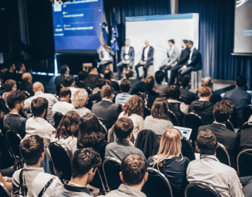 The Marketing Conferences Worth Your Time in Fall 2025 A roundtable presentation at a marketing conference.