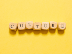 The Cultural Power of Branding: How Brands Influence Norms, Values, and Trust Letter blocks spelling out the word "culture" sit against a yellow background, emphasizing the cultural power of brands as the central theme of the piece.