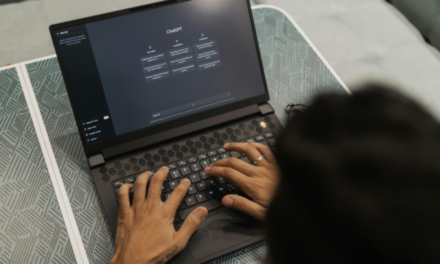 A marketer on a laptop uses ChatGPT. Soon, ChatGPT could be integrated into the marketing stack as the company has introduced ads into the mix,